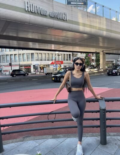 Catherine in professional attire at Tokyo business district